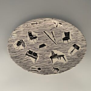 Large oval Plate with 12 motifs, size 11.75" x 8.75" / 30 x 22 cm with earlier Homemaker Made in England backstamp.