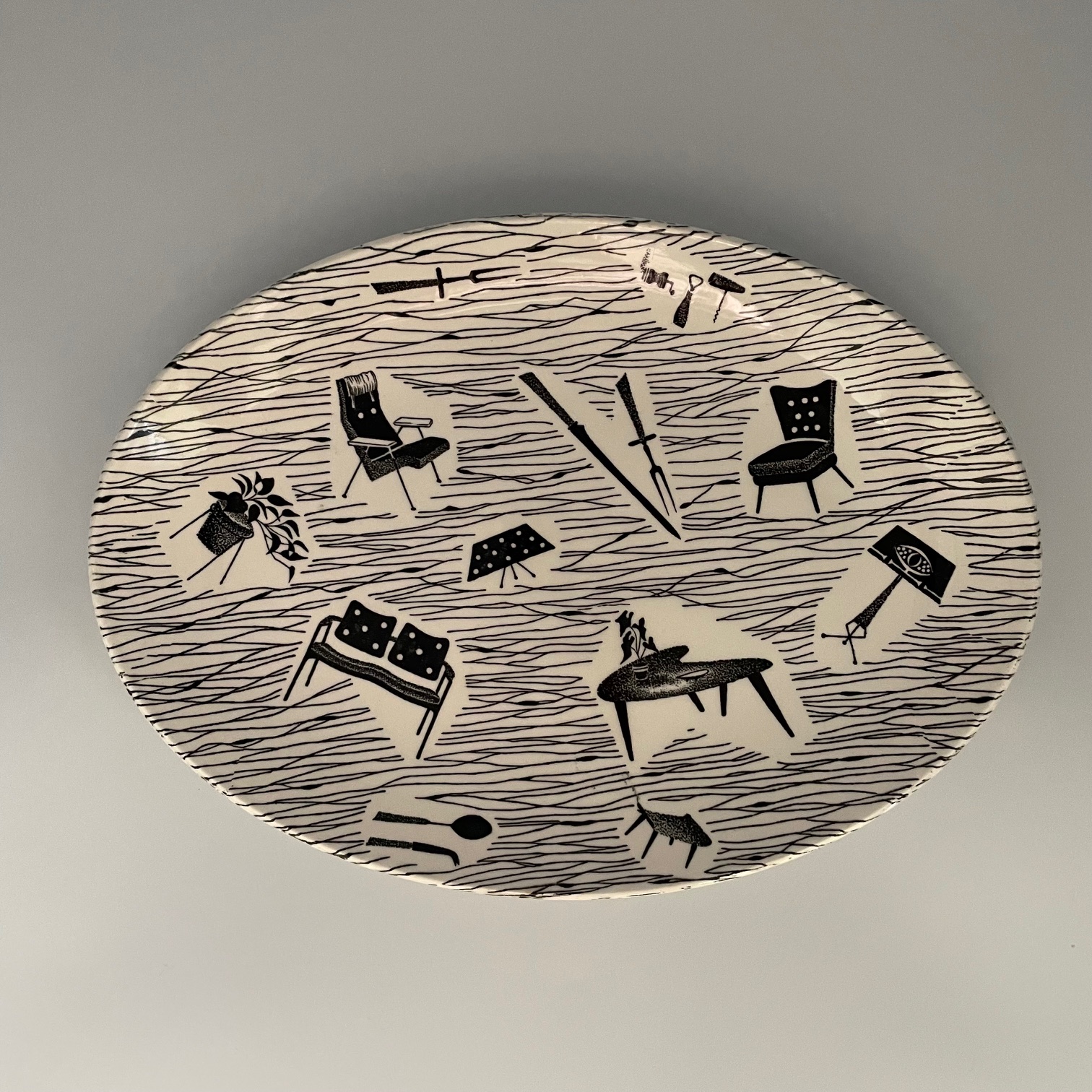 Large oval Plate with 12 motifs, size 11.75" x 8.75" / 30 x 22 cm with earlier Homemaker Made in England backstamp.